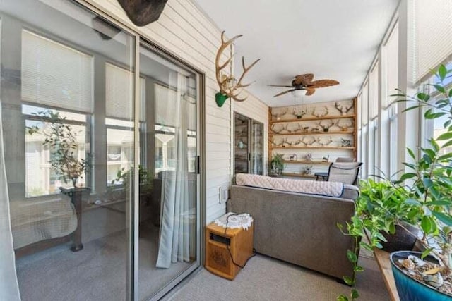 balcony featuring ceiling fan