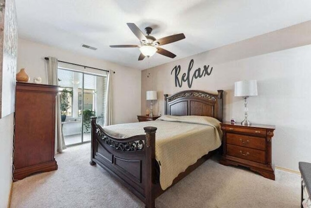 bedroom with light carpet and ceiling fan