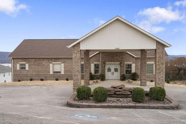 135 Upper Emerald Bay Cir Unit G-5, Hollister, MO 65672 - view of front facade featuring brick siding