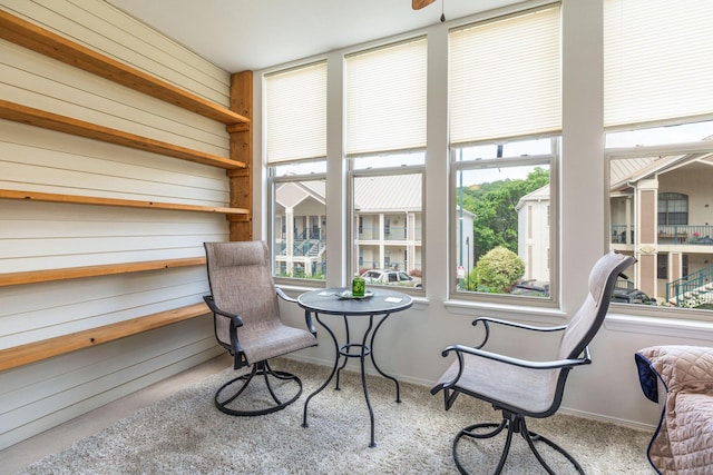 135 Upper Emerald Bay Cir Unit G-5, Hollister, MO 65672 - sunroom featuring carpet floors and baseboards