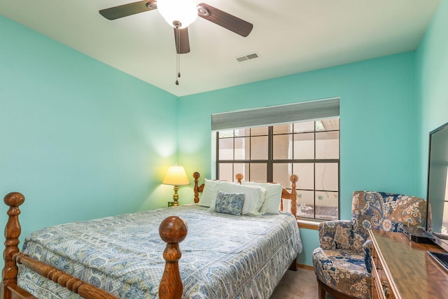 135 Upper Emerald Bay Cir Unit G-5, Hollister, MO 65672 - carpeted bedroom featuring a ceiling fan, visible vents, and multiple windows