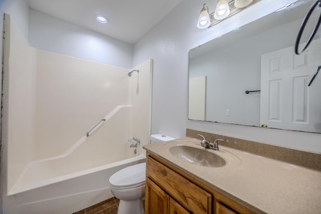 full bathroom featuring tile patterned floors, vanity, toilet, and tub / shower combination