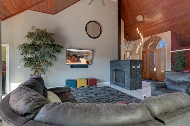 living room with high vaulted ceiling, wooden ceiling, and a multi sided fireplace