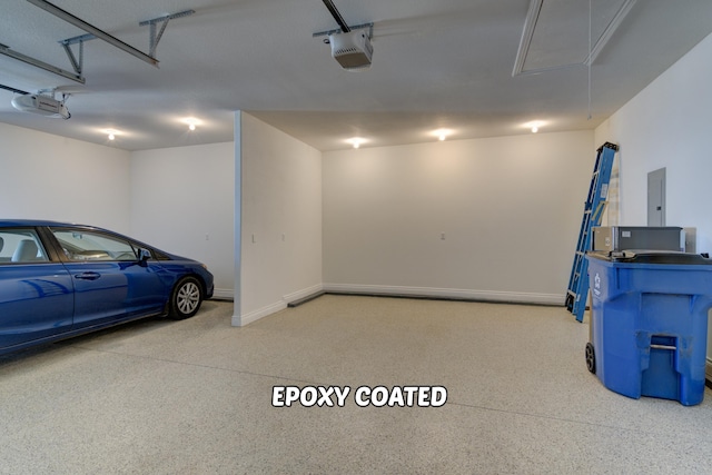 garage featuring a garage door opener and electric panel