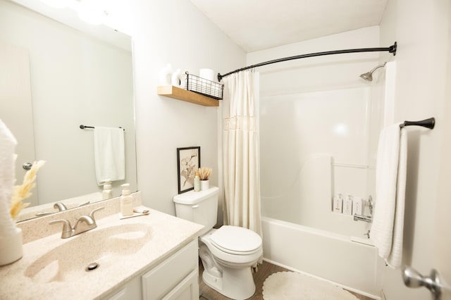 full bathroom featuring vanity, toilet, and shower / tub combo with curtain