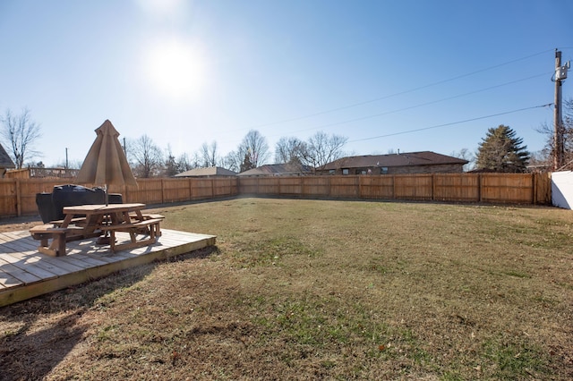 view of yard with a wooden deck