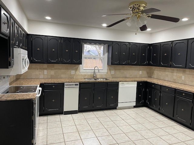 kitchen with ceiling fan, sink, backsplash, and white appliances