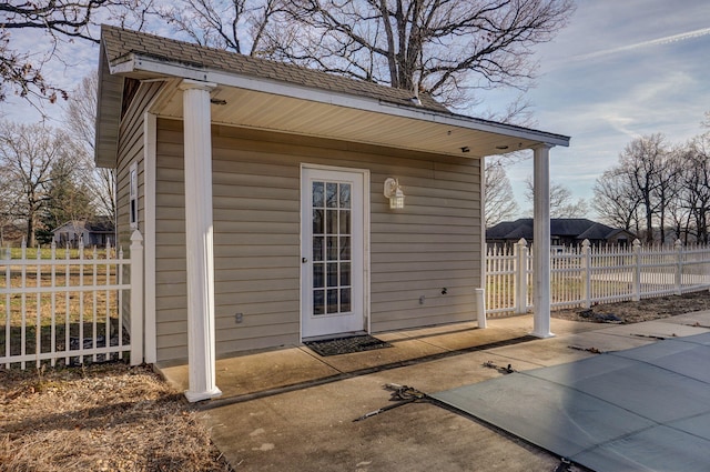 property entrance featuring a patio