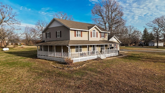 farmhouse inspired home with covered porch and a front lawn