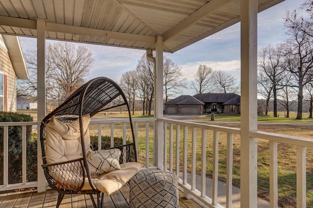 balcony featuring a porch