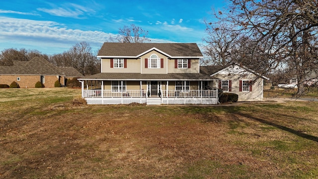 farmhouse-style home with a porch and a front yard