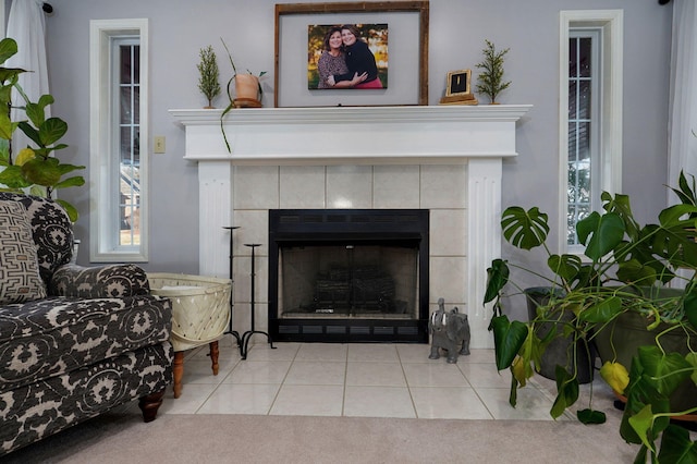 room details featuring a tile fireplace