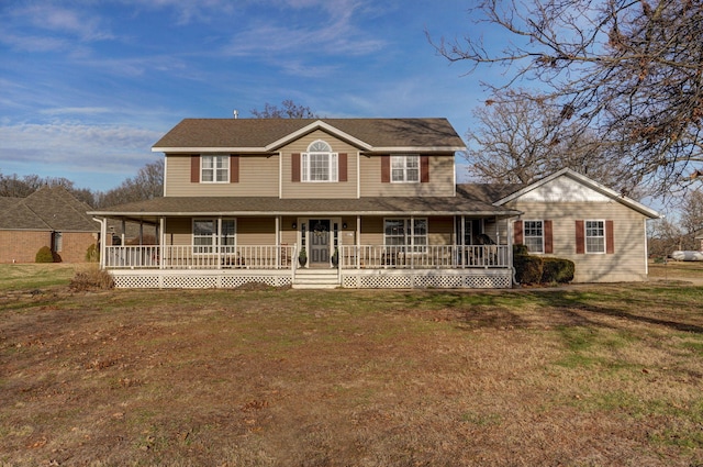 farmhouse with a porch and a front lawn