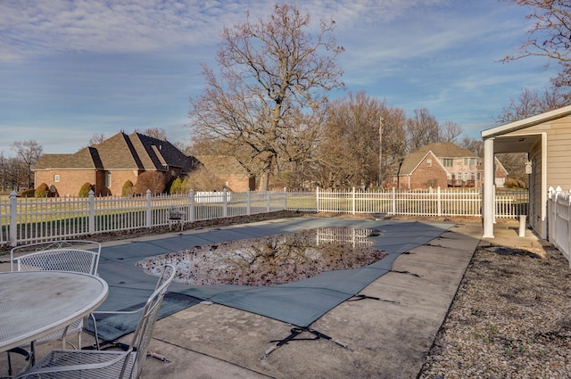 view of swimming pool featuring a patio