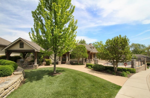 view of community featuring a gazebo and a yard