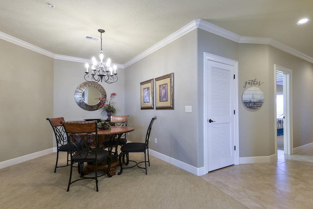 dining room featuring crown molding, light tile patterned floors, and a notable chandelier