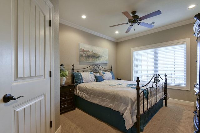 bedroom with light carpet, ornamental molding, and ceiling fan