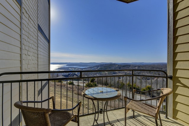 balcony featuring a mountain view