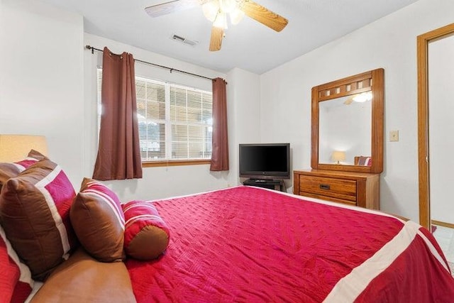 bedroom featuring ceiling fan