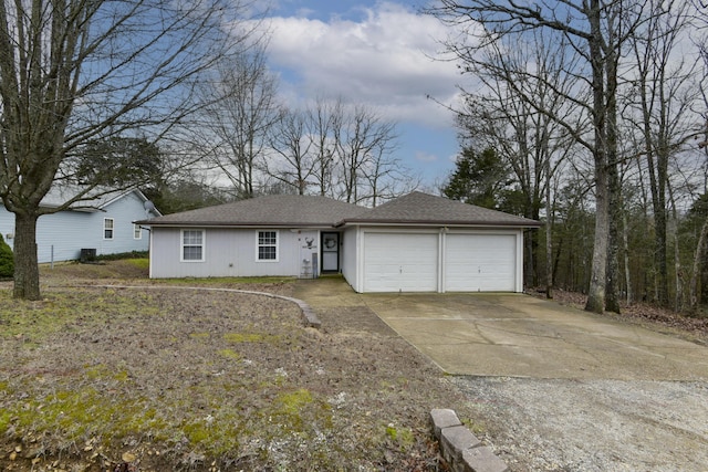 single story home featuring a garage