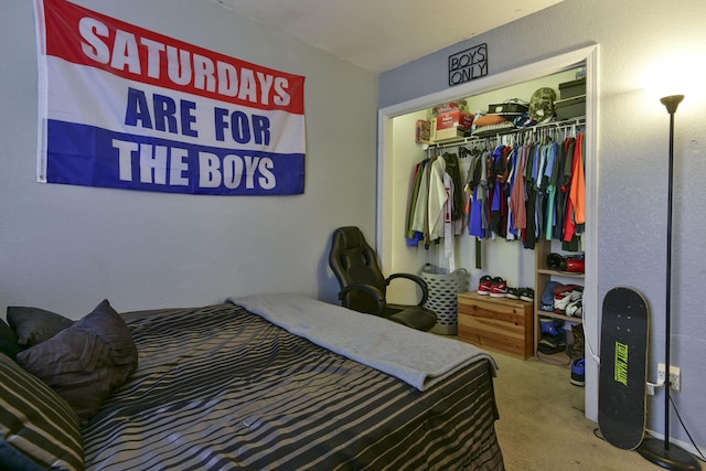 bedroom with carpet floors and a closet