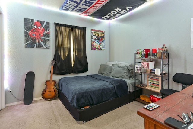 bedroom featuring carpet