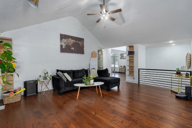 living room with ceiling fan, dark hardwood / wood-style floors, and high vaulted ceiling