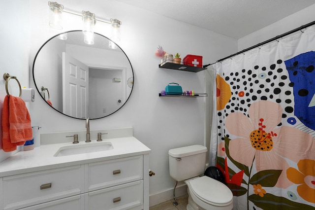 bathroom with a shower with curtain, vanity, a textured ceiling, and toilet