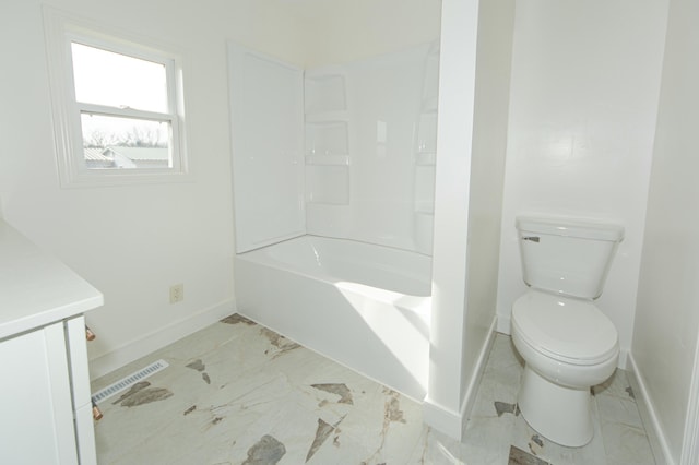 full bathroom with bathtub / shower combination, vanity, and toilet