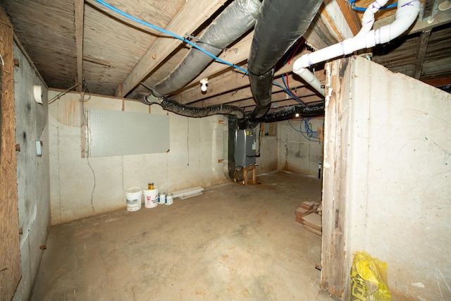 basement featuring heating unit