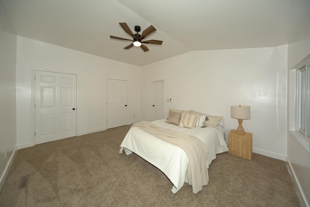 bedroom with lofted ceiling, carpet floors, and ceiling fan