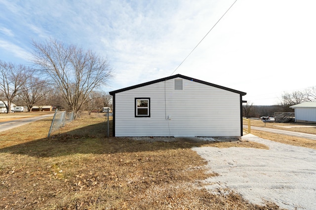 view of home's exterior featuring a lawn