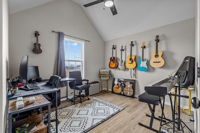 office space with ceiling fan, lofted ceiling, and light hardwood / wood-style flooring