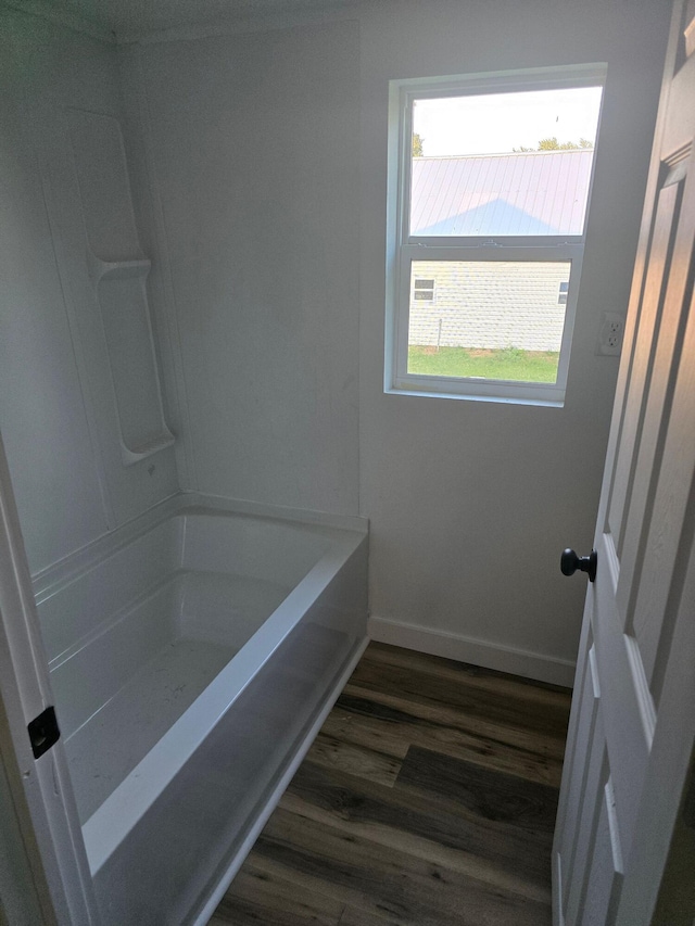 bathroom with hardwood / wood-style flooring