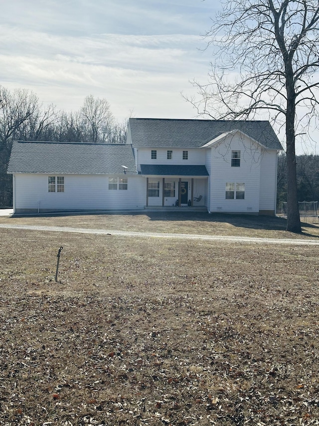 view of front of home with a front lawn