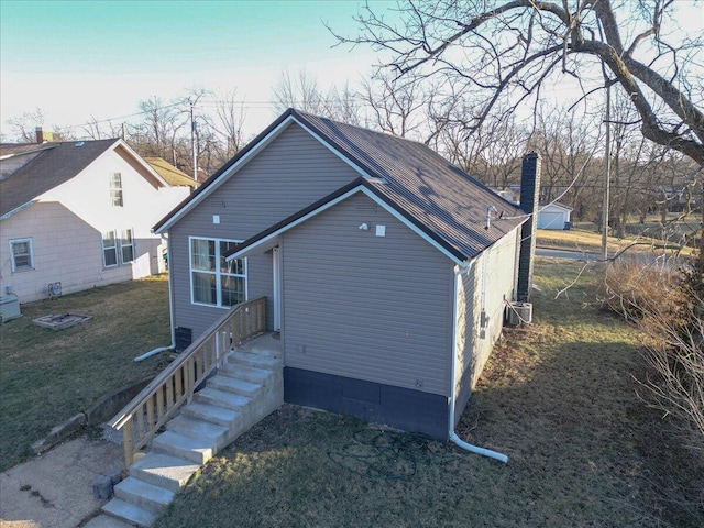 exterior space with a front yard