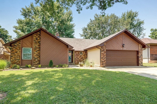 view of front facade featuring a garage and a front yard