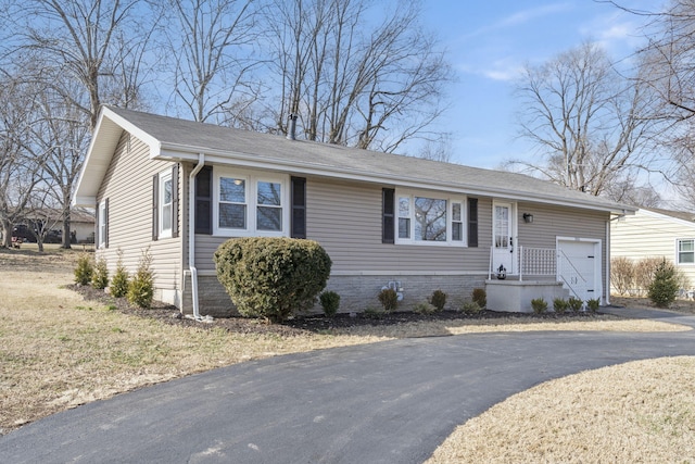 single story home with a garage