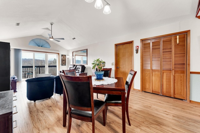 dining room with lofted ceiling, light hardwood / wood-style flooring, and ceiling fan