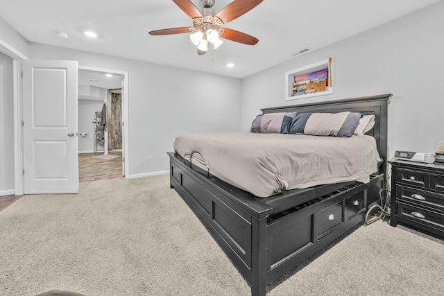 carpeted bedroom with ceiling fan