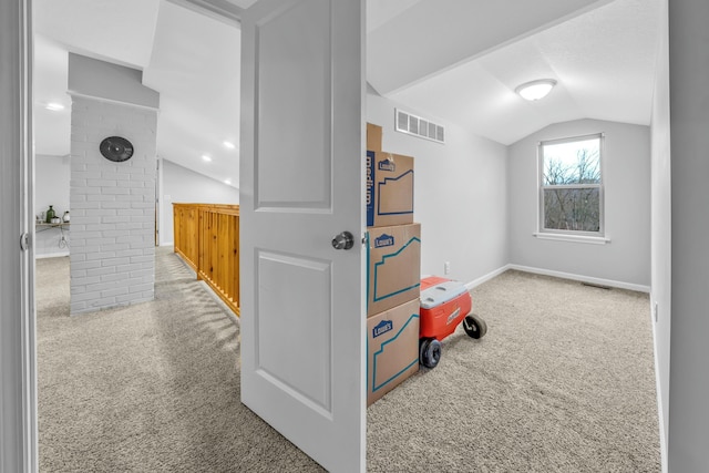 playroom featuring carpet flooring and vaulted ceiling