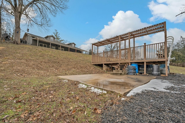 view of yard featuring a patio, a deck, and a pergola