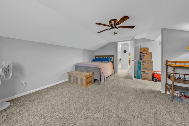 carpeted bedroom featuring lofted ceiling and ceiling fan