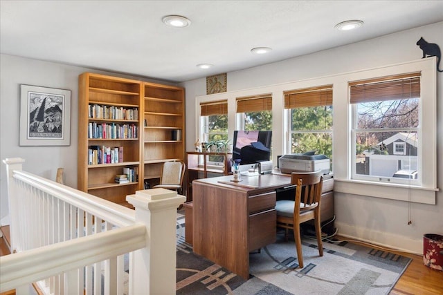 office area with hardwood / wood-style floors