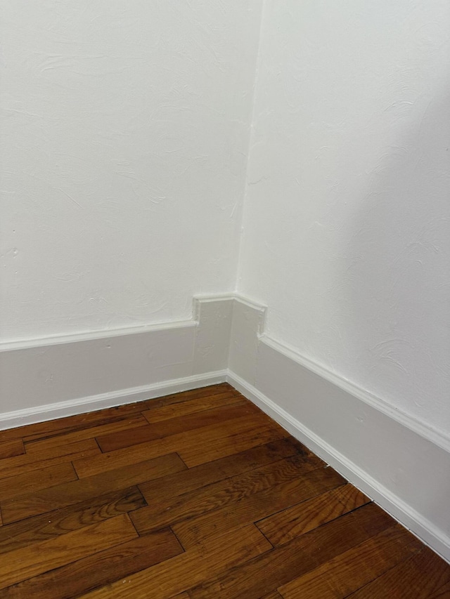 interior details featuring hardwood / wood-style flooring