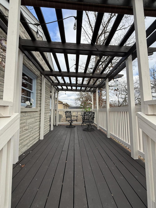 view of snow covered deck