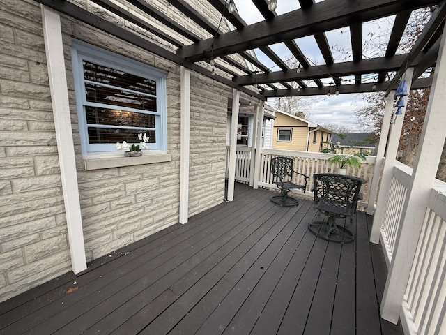 wooden deck with a pergola