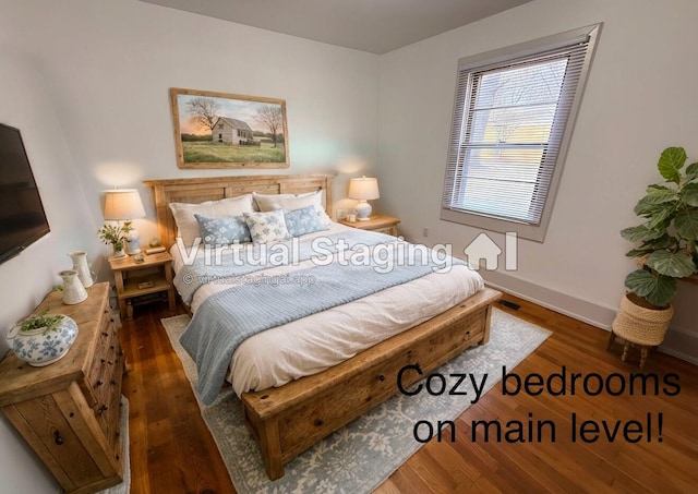 bedroom featuring dark wood-type flooring