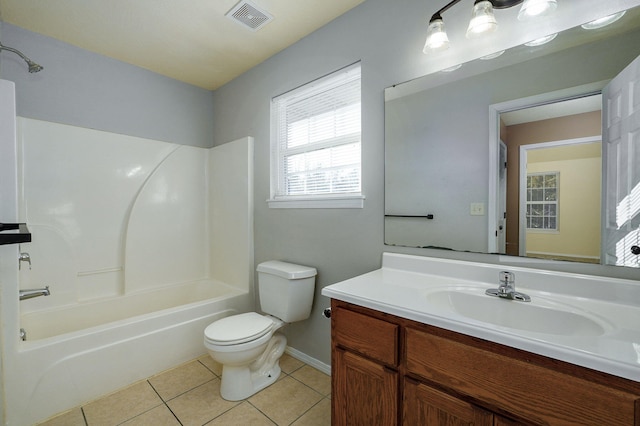 full bathroom with tile patterned flooring, vanity, bathing tub / shower combination, and toilet