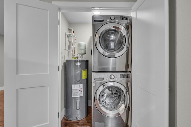 laundry room with stacked washer / drying machine, dark hardwood / wood-style floors, and water heater